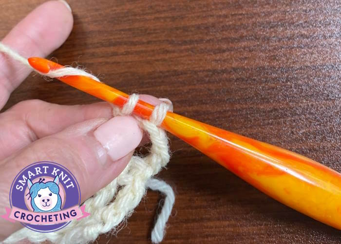 Treble crochet stitch tutorial, 2 loops left on hook