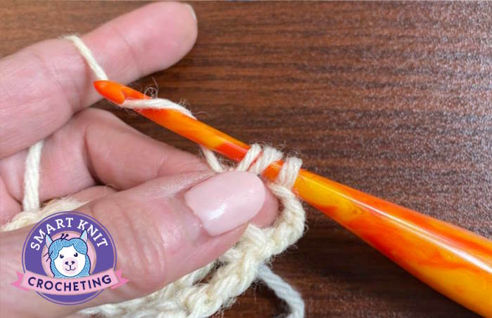 The treble crochet stitch tutorial with 3 loops on hook