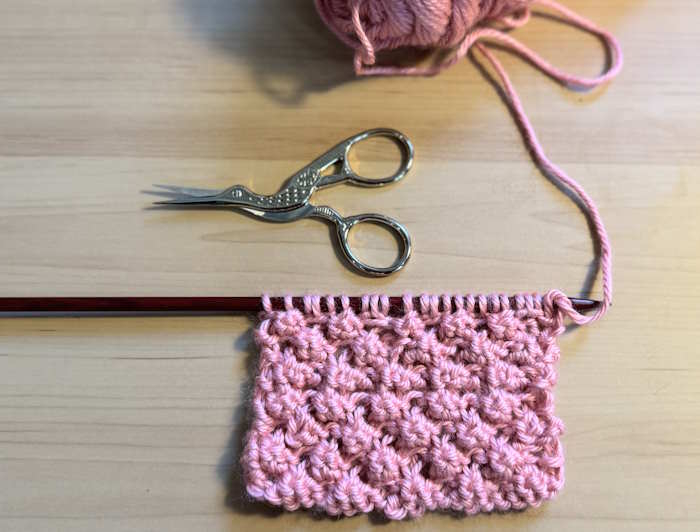 A sample of textured knit stitch  patterns, this one is the Trinity or Rasberry stitch patterns A sample of textured knit stitch  patterns, this one is the Trinity or Rasberry stitch patterns
