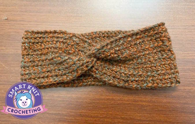 A headband created with chrochet using 100% alpaca yarn