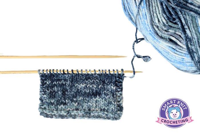 A swatch of stockinette knit stitch made with varigated yarn.