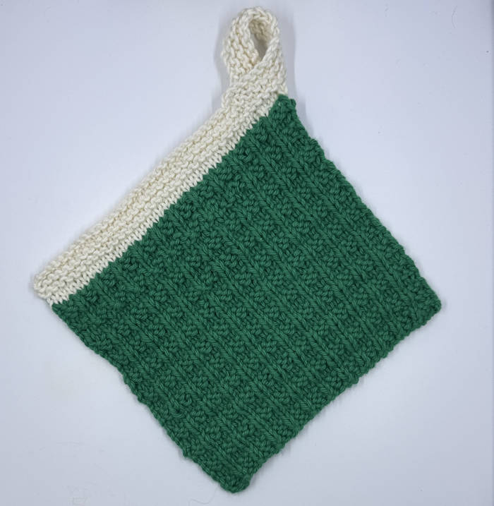 Diagonal view of the knit waffle stitch dishcloth Diagonal view of the knit waffle stitch dishcloth