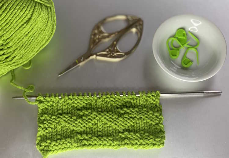 Waved Welt Knit Stitch Pattern Waved Welt Knit Stitch worked in green color acrylic yarn
