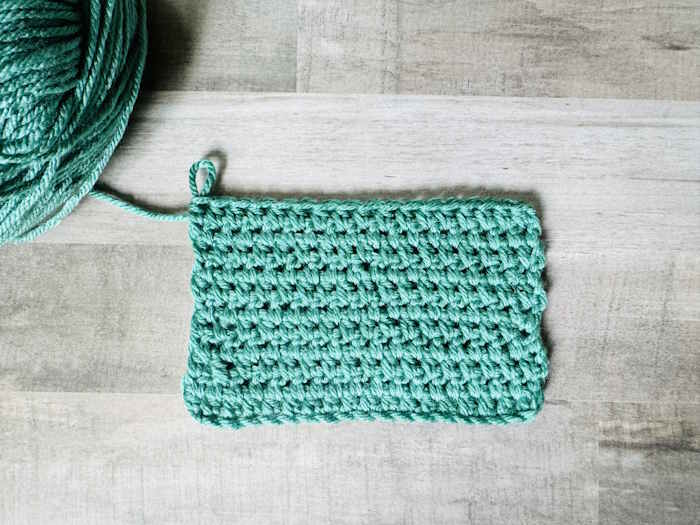 Wide half double crochet stitch worked in green