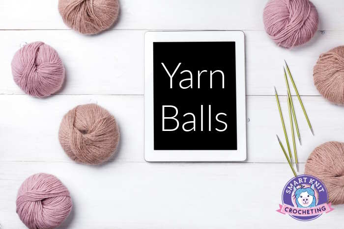 A group of yarn balls made up of yarn wound into small ball shaped skeins A group of yarn balls made up of yarn wound into small ball shaped skeins