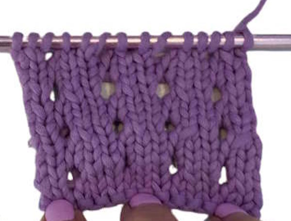 Example knit swatch of yarnovers Example knit swatch of yarnovers